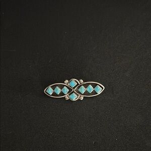 Vintage Native American Zuni turquoise/sterling silver brooch.